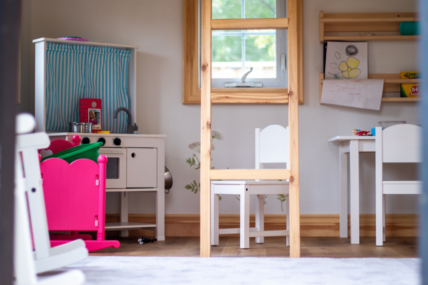 Playhouse interior with child-size play kitchen