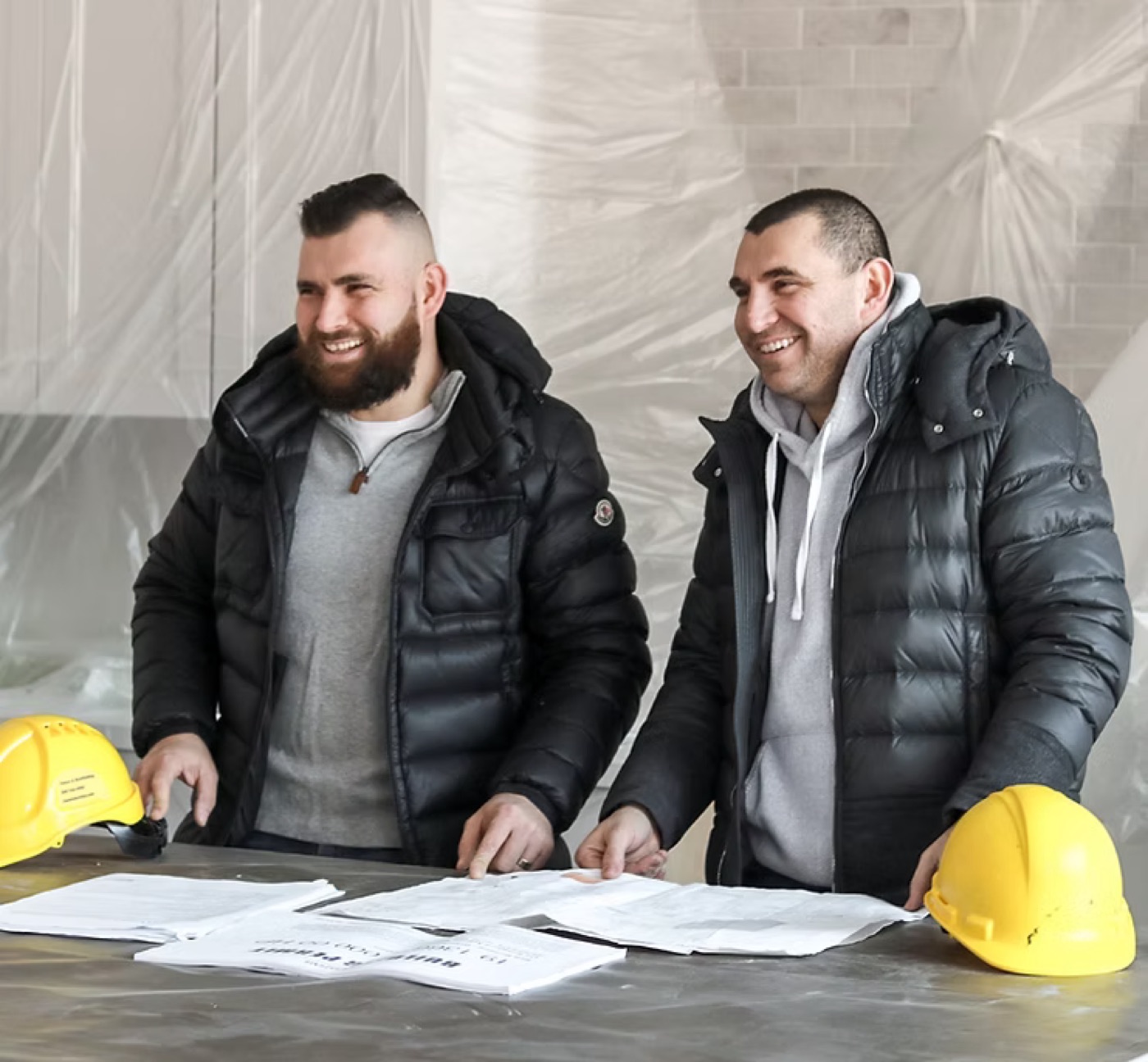 The Old York Custom team reviewing blueprints on site